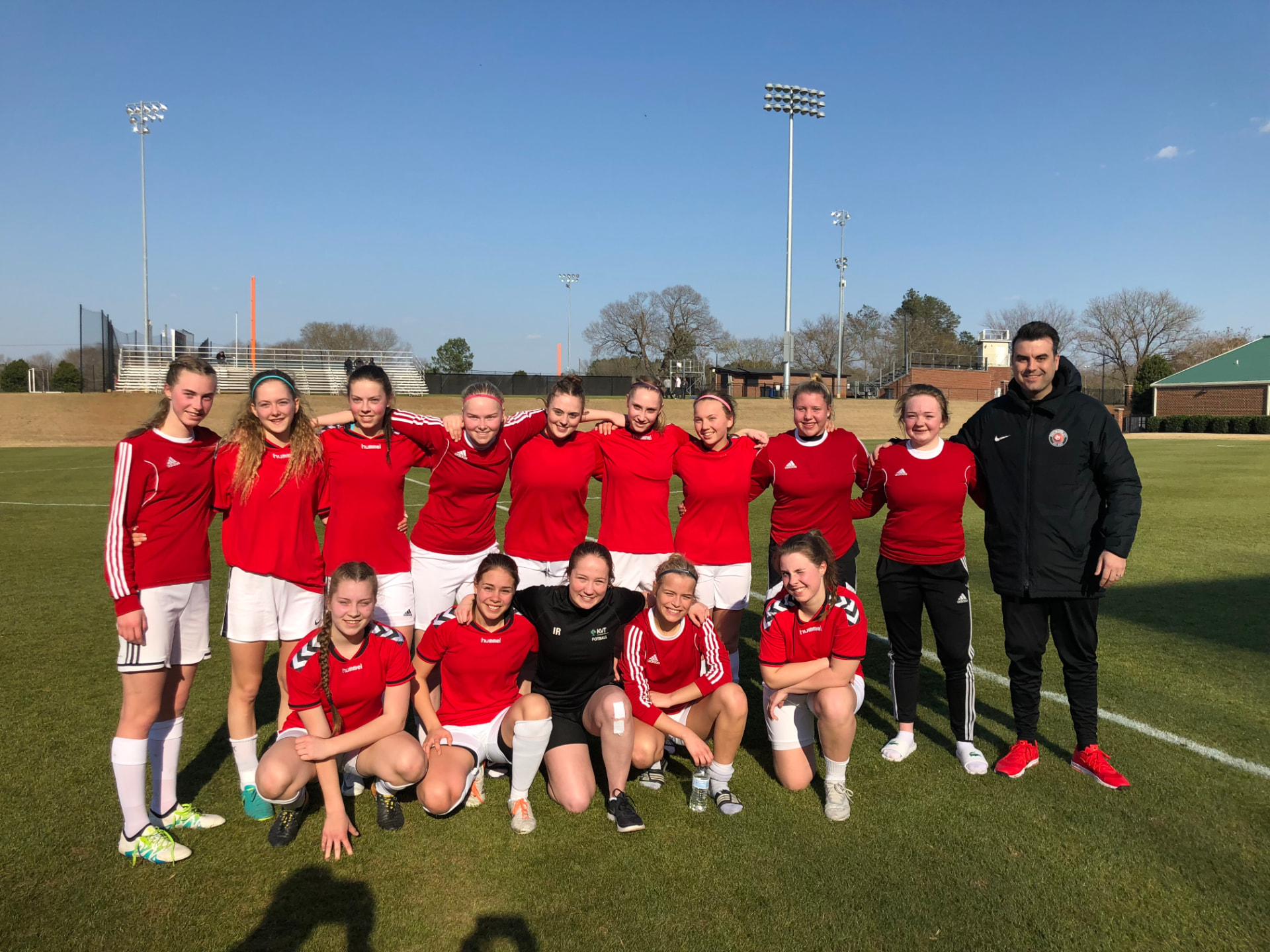 Stride USA girls' squad on an NCAA college pitch in North Carolina